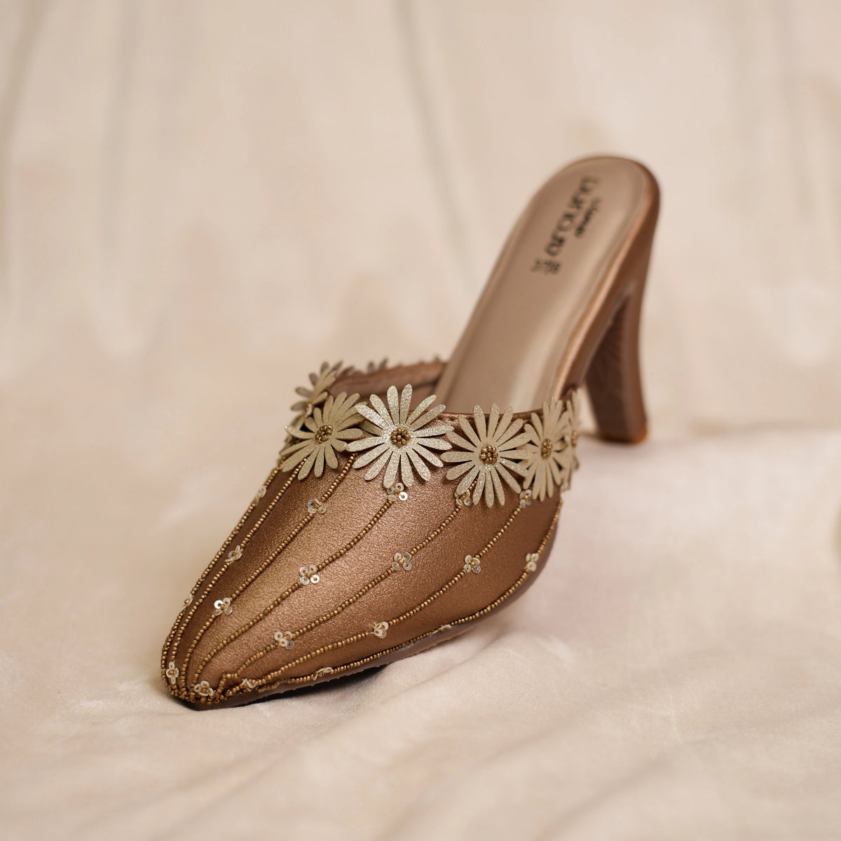 Nebula bronze pointed toe heeled mule with daisy trim and flared heel by Around Always
