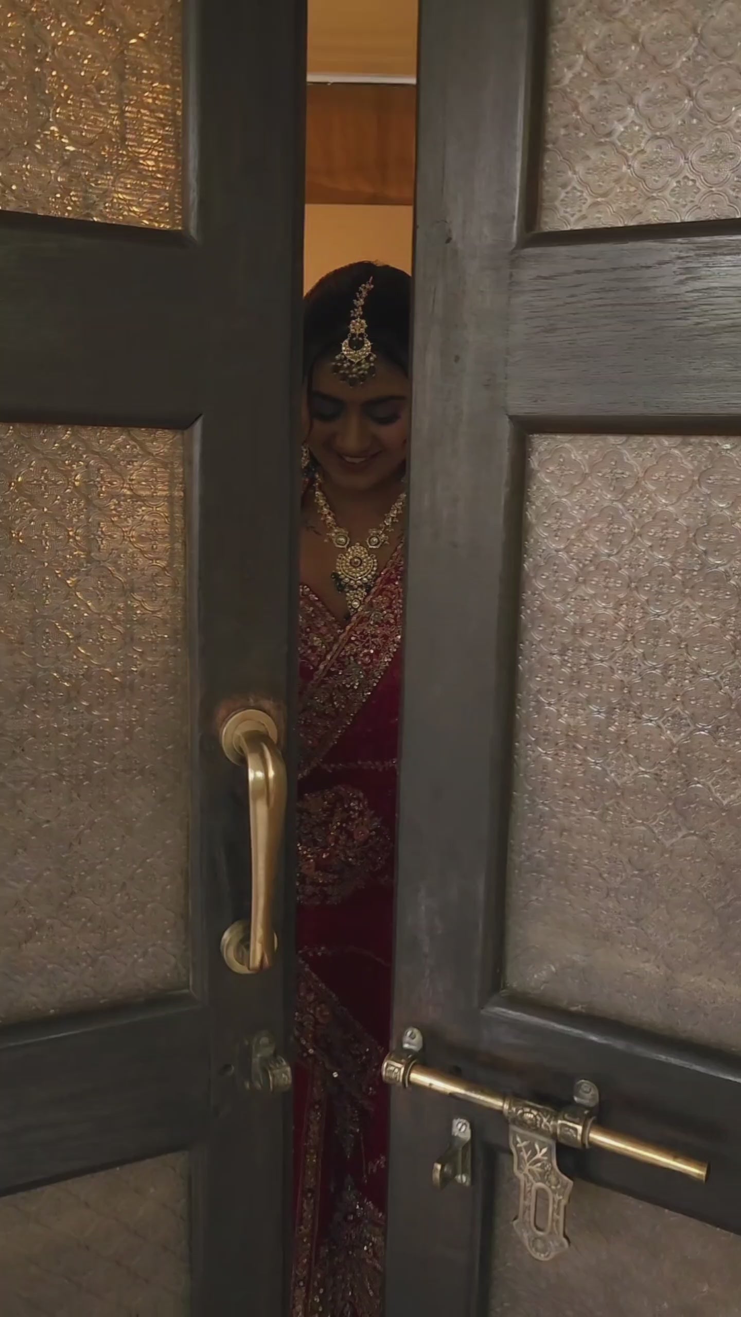 Royal red bridal heels with thread and zardozi embellishments to match couture wedding lehenga