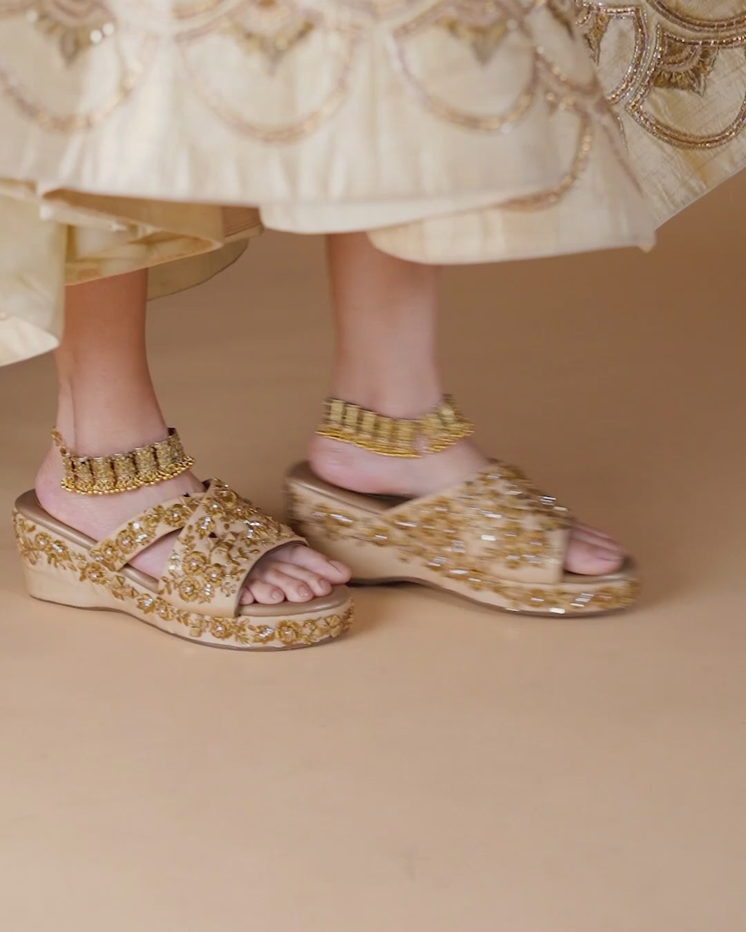 Golden Wedges with mirror work for a versatile wedding outfit 