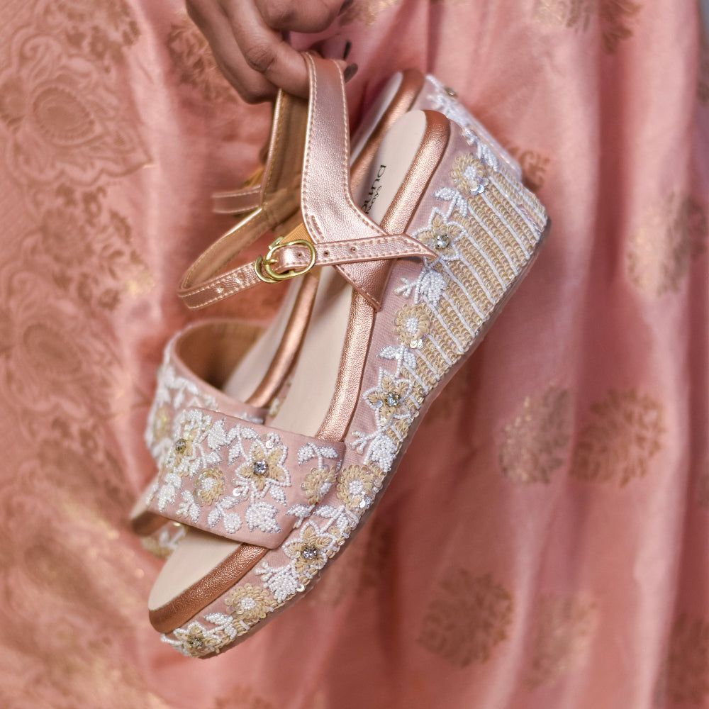 Blush wedge heels with floral beadwork and ankle strap