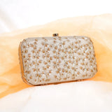 Serene champagne gold clutch with sequin sprigs for weddings and Diwali