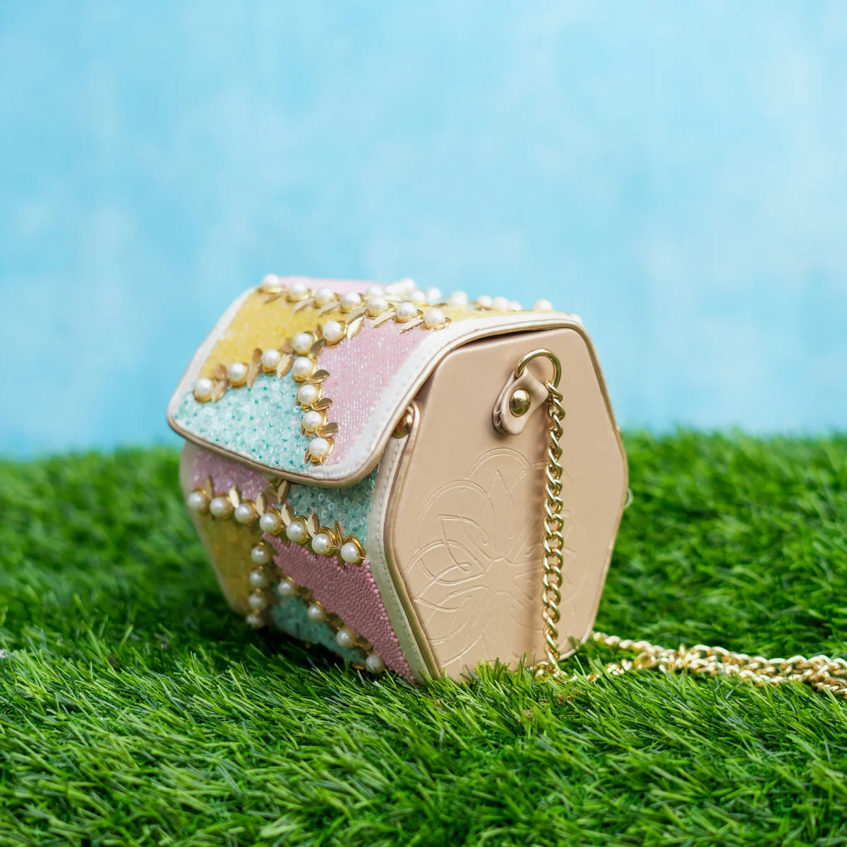 Sugar pastel patchwork bag front view with long gold chain