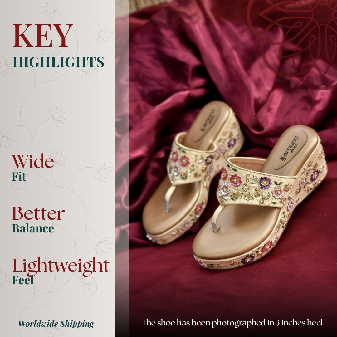 Gold embroidered wedge with floral detailing, wide-fit comfort, and lightweight platform for balanced festive wear