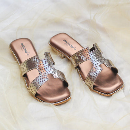 Shiny Golden H Shaped Chappals in low heels
