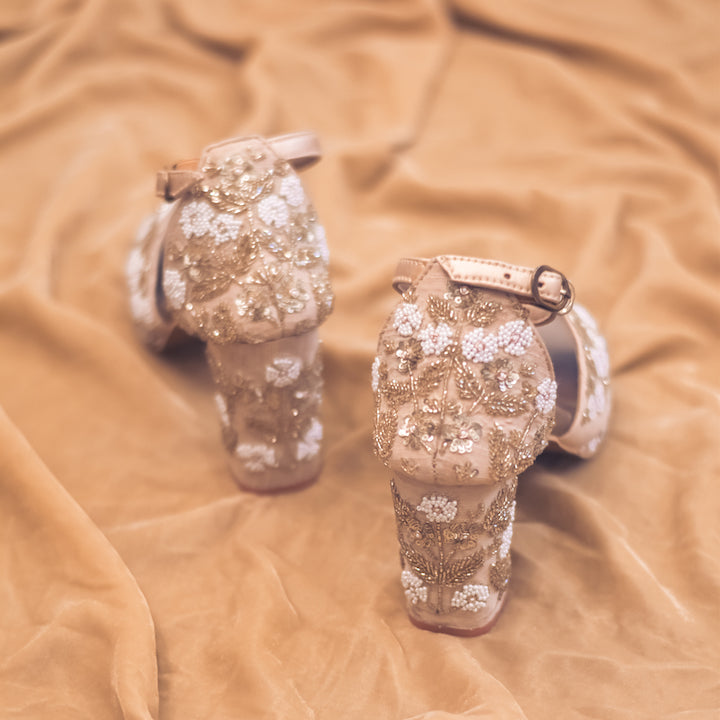 Embroidered golden block heel sandals