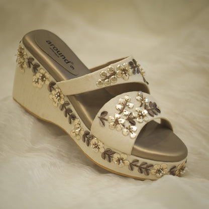 Golden wedges in high heels for girls