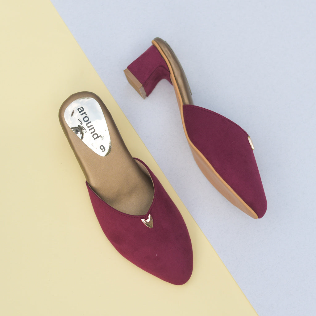 Classic maroon suede heels with golden highlights