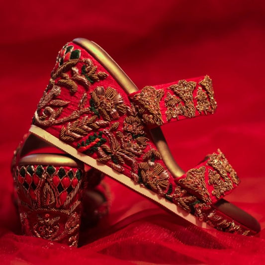 Exquisite bridal wedges in red colour and zardozi embroidery
