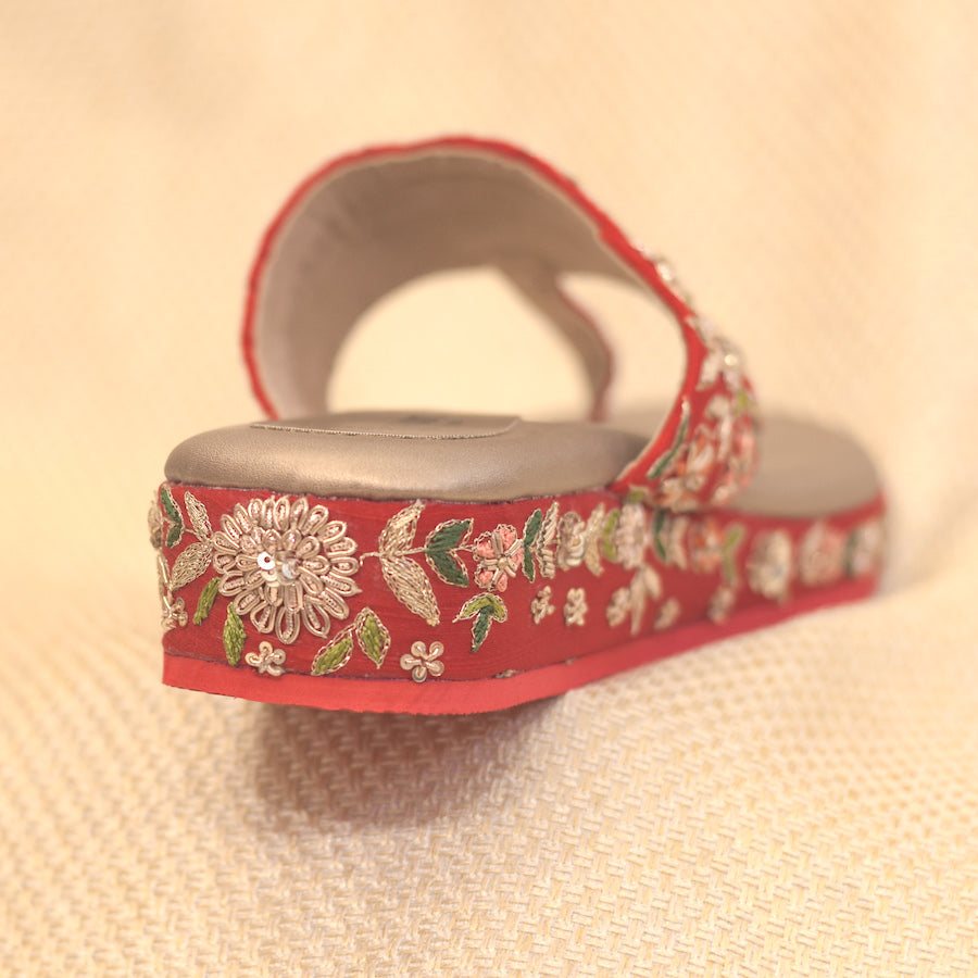 Intricate handemboidery on bridal heels