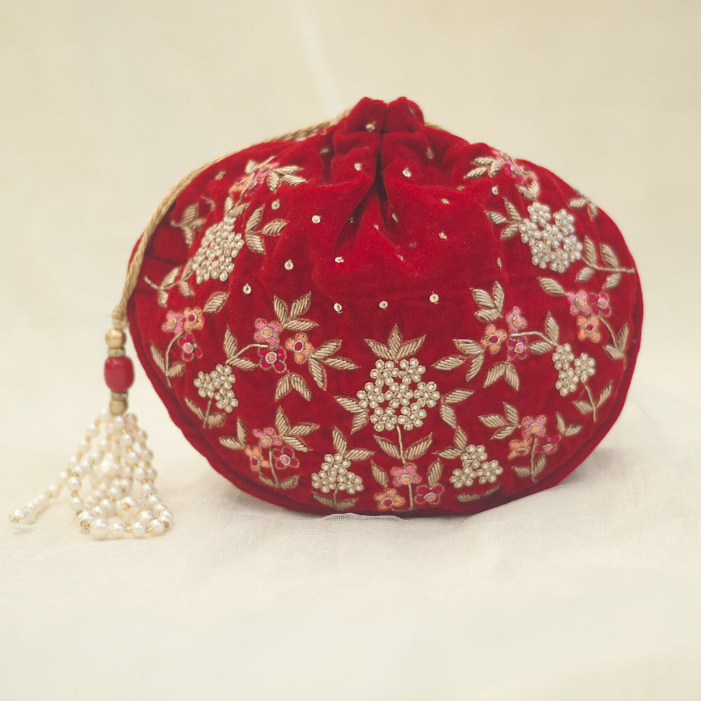 Hand embroidered designer potlis for weddings and functions